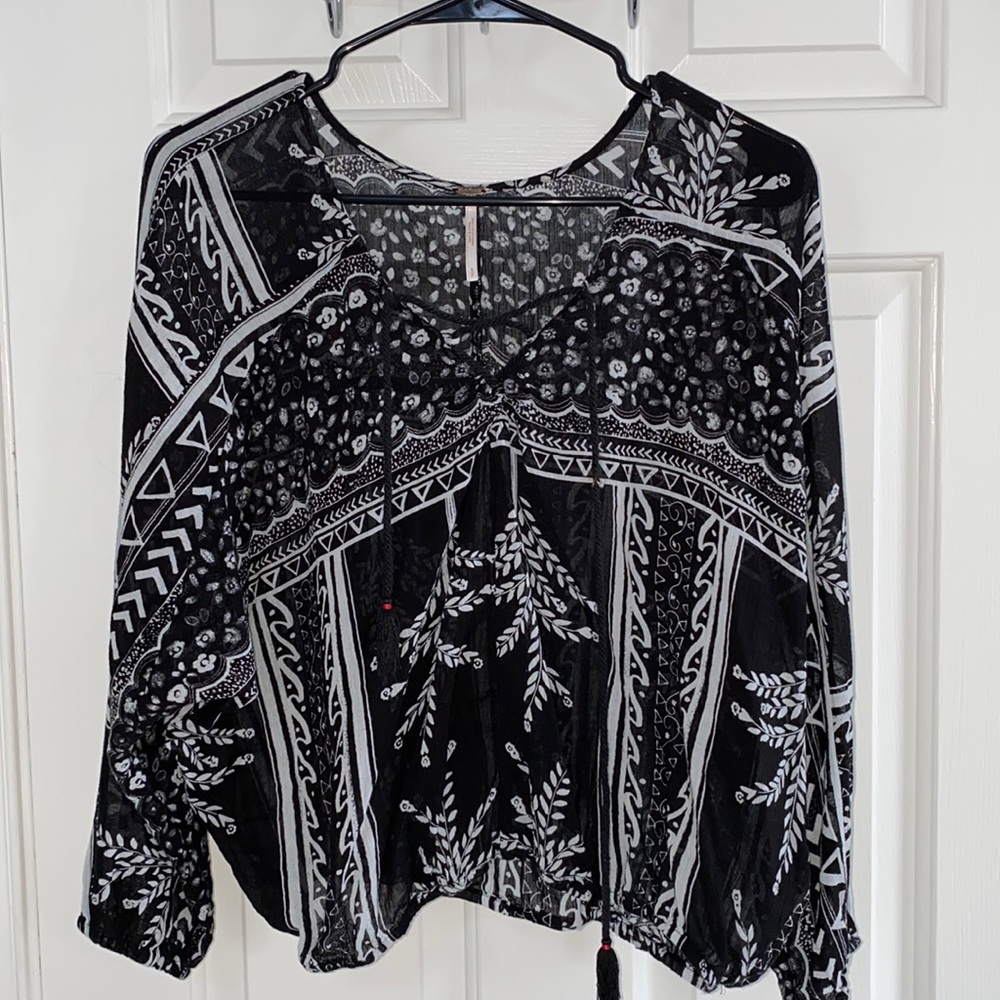 Free People size S/P women’s blouse. Worn before, good condition.